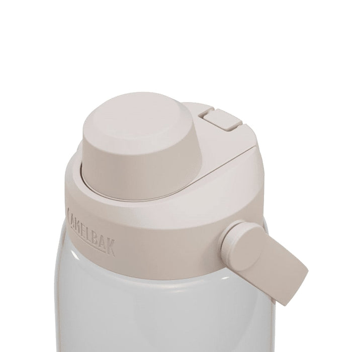 CamelBak - Thrive Chug 1.0L - A drink bottle with a beige lid and a white body, featuring a flip-top spout and a logo.