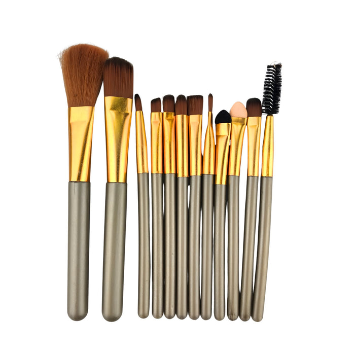 12-Piece Brush with Metal Box Set - A 12-piece brush set featuring various brush types with gold ferrules and grey handles, stored in a metal box.