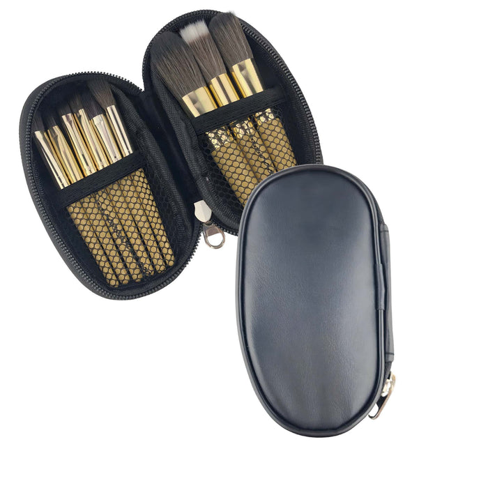 9 Brushes in a Case - A black case opening to reveal nine brushes with golden handles and mesh pockets. The case has a zip closure.