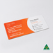 DL Envelope Size Magnet (99mm x 210mm) - A rectangular, double-sided business card featuring orange and white colours, with contact details and a logo.