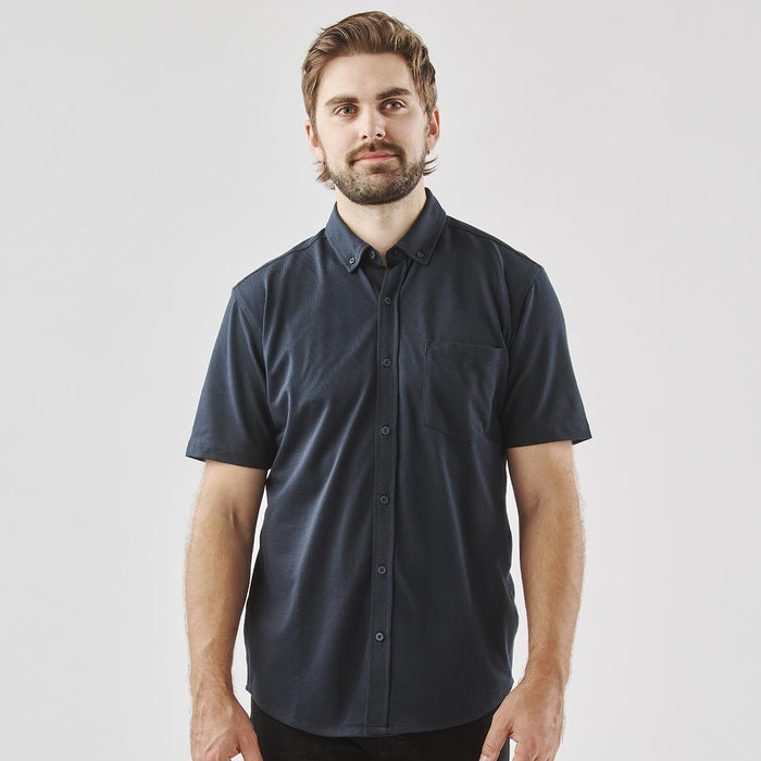Men's Sonora Short Sleeve Knit Shirt - Men's button-up shirt in dark navy blue, featuring a short sleeve design and a chest pocket. Includes a logo.