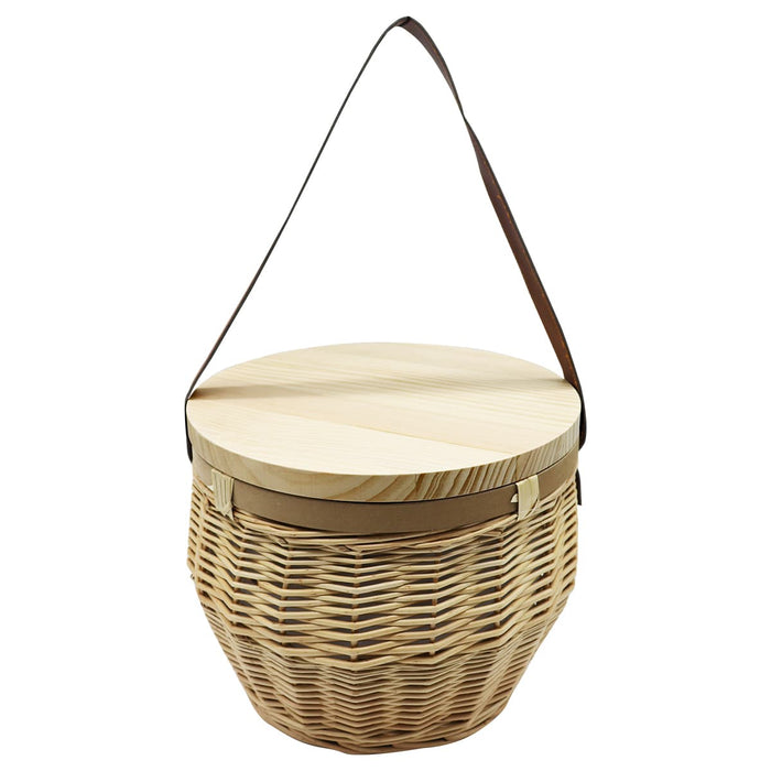 Saint-Rémy Cooler Basket - A natural woven basket with a round wooden lid and a brown shoulder strap. It features a textured finish.