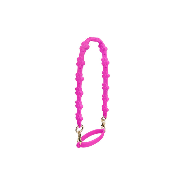 Silicone Flower Tumbler Strap - A drink bottle strap in vibrant pink, featuring a floral design and clips for attachment.