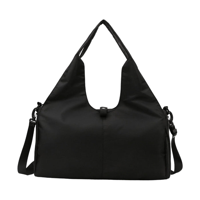 Duffle Bag With Yoga Mat Strap - A black duffle bag with a yoga mat strap and adjustable shoulder strap, featuring a logo on the side.