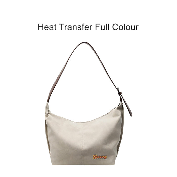 Dumpling Canvas Tote Bag - A light beige canvas tote bag with a brown strap and a logo, featuring a simple, stylish design.