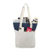 Field & Co.® Parks Day Tote - A white and navy tote bag with a drink bottle, phone, magazines, and a snack pack visible inside.