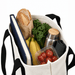 Mini Canvas Tote - A mini canvas tote in cream filled with a loaf of bread, vegetables, a drink bottle, bananas, and a notebook.