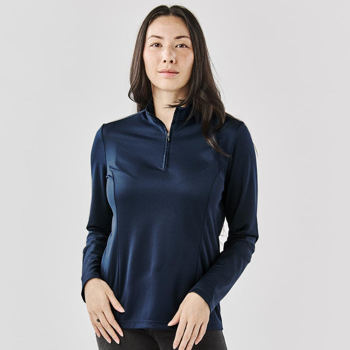 Women's Monterey 1/4 Zip Pullover - A women's 1/4 zip pullover in navy blue, featuring long sleeves and a subtle logo.