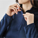 Women's Monterey 1/4 Zip Pullover - A women's navy blue Monterey 1/4 zip pullover, featuring a zip collar and long sleeves. It has a logo restraint.