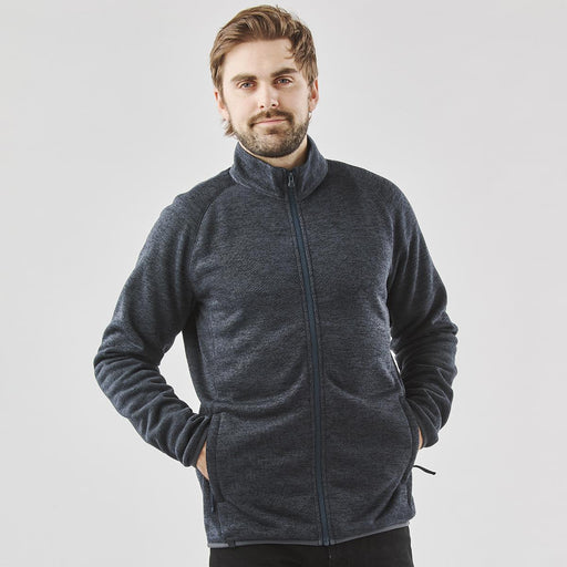 Men's Yosemite Full Zip Fleece Jacket - A man wearing a navy polar fleece jacket with a full zip, featuring a collar and side pockets.