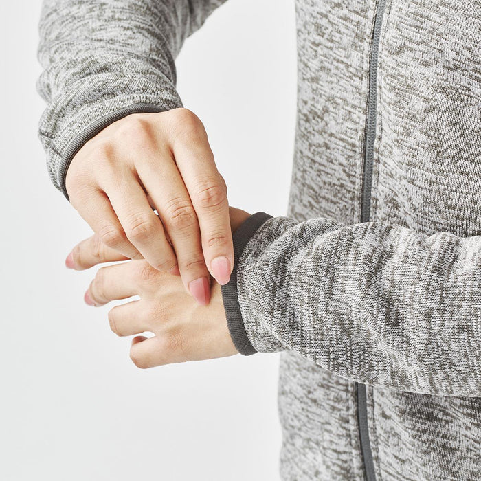 Women's Yosemite Full Zip Fleece Jacket - A close-up of a woman's hands adjusting the cuffs of a grey fleece jacket with a full zip.