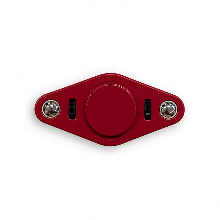 Vibro Fidget Spinner - A red fidget spinner with two switches and a central button, featuring shiny silver ends and a smooth surface.