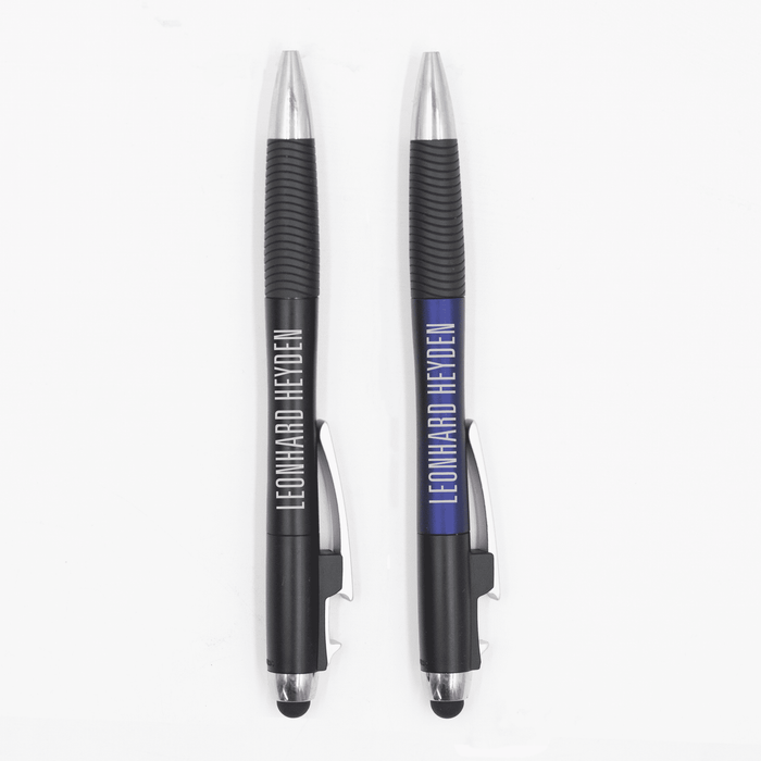 The Ironhide Pen - A pair of black pens with silver accents and branding, featuring rubber grips and stylus ends.