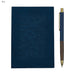Falby Notebook and Pen Gift Set - A blue notebook with a textured cover and a matching pen with a gold accent, featuring a logo.