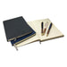 Falby Notebook and Pen Gift Set - A set of two notebooks in dark blue and black, accompanied by three pens with wooden and metallic accents.