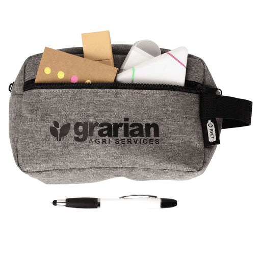 Stationary Essentials Pack - A grey stationery pouch with a logo, containing sticky notes, paper, and a black and white pen.