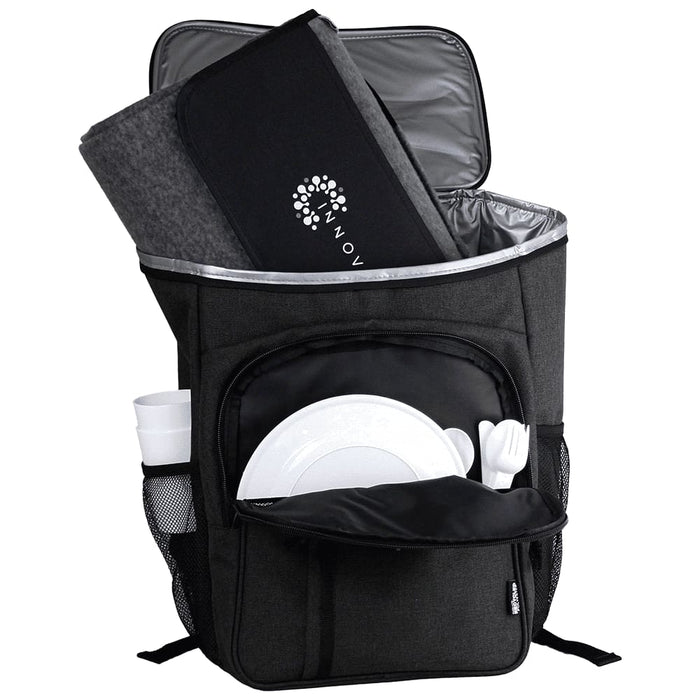 Picnic Pack - A grey picnic backpack with a thermal compartment, containing a blanket, plates, cutlery, and drink bottles.