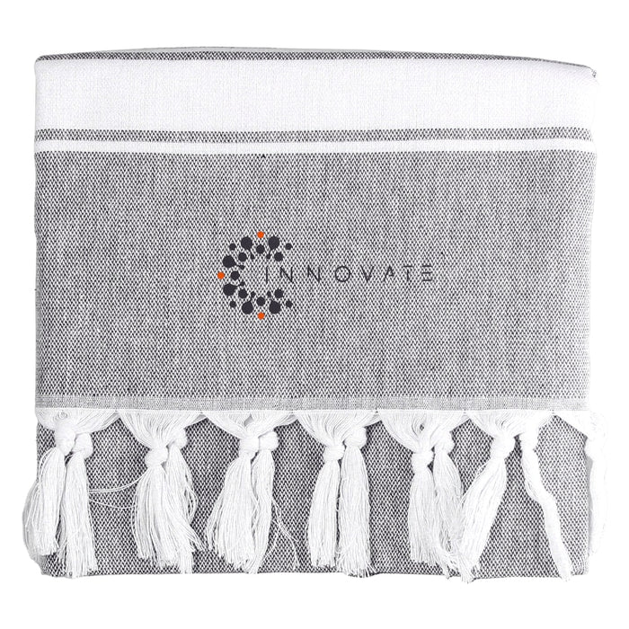 Towel & Cooler Bundle Pack - A grey towel with white fringes and a logo in the centre.
