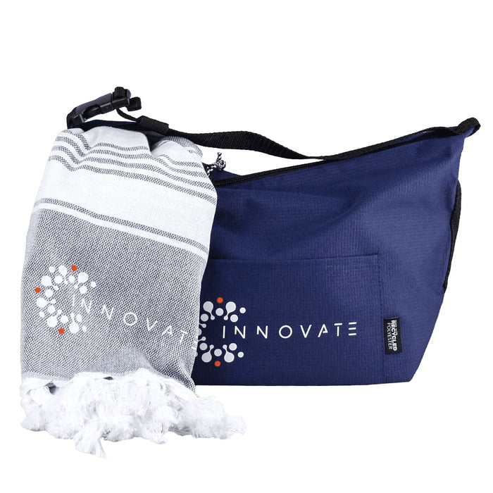 Towel & Cooler Bundle Pack - A navy cooler bag with a logo, accompanied by a grey and white towel, both neatly arranged.