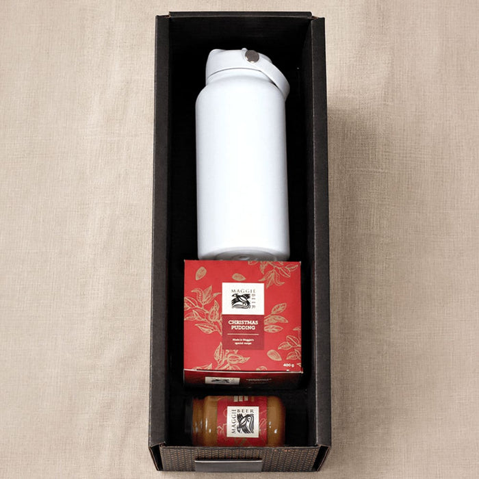 Festive Essentials Set - A white drink bottle, Christmas pudding box, and a small jar in a black gift box.
