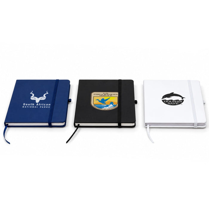 FSC Notebook - Three FSC notebooks in blue, black, and white, each with a distinct logo on the cover.