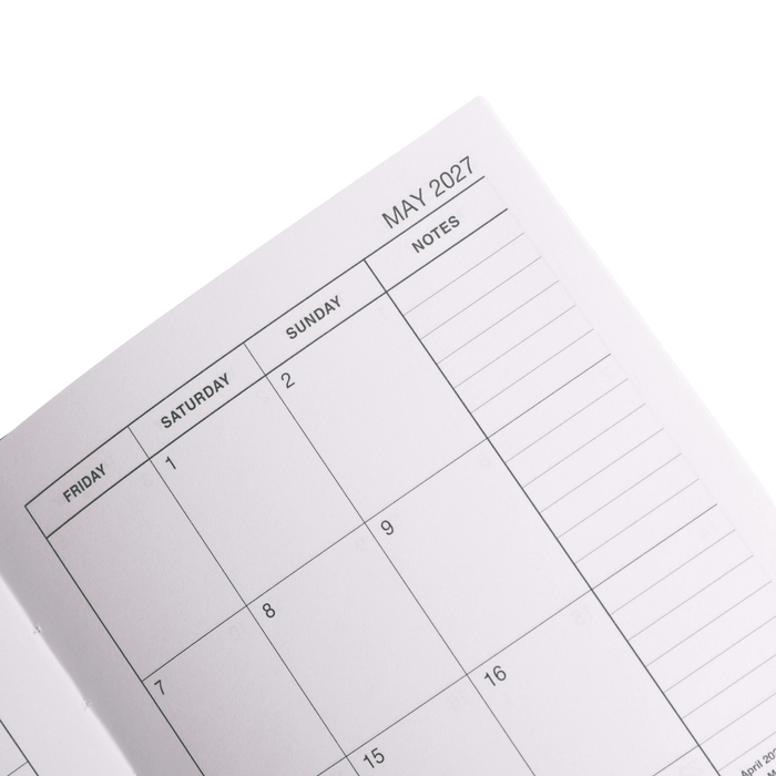 Penguin A5 Weekly Diary - A weekly diary in shades of white and grey, featuring a monthly calendar layout with space for notes.