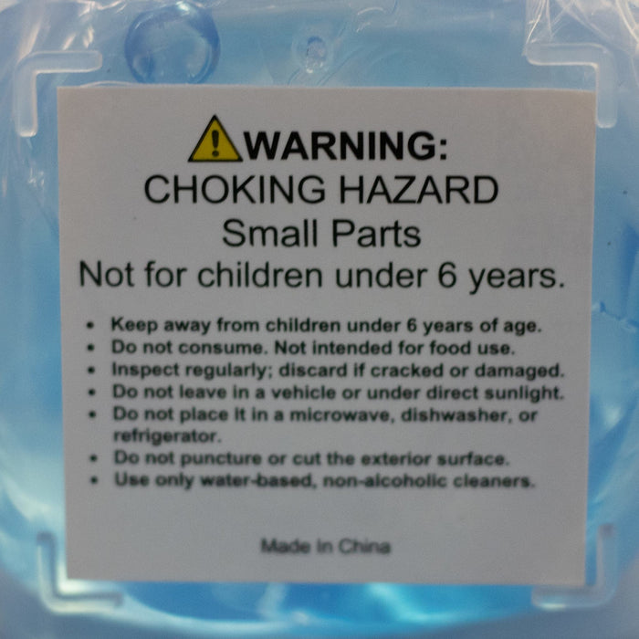 Jelly Cube Sensory Toy - A jelly cube sensory toy in blue with a warning label about choking hazards and care instructions.