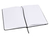 Essentials A5 Notebook - An A5 notebook with a black cover and blank lined pages, opened to display its interior.