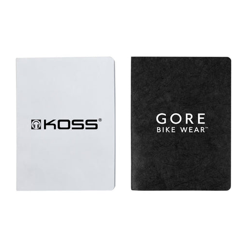 Koda Survival Notebook (Blank Pages) - Two notebooks, one with a white cover and a logo, the other with a black textured cover displaying a logo.