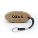Cork Floating Keychain - A cork keychain in an oval shape with a black rope attached and a metallic keyring. It features a logo.