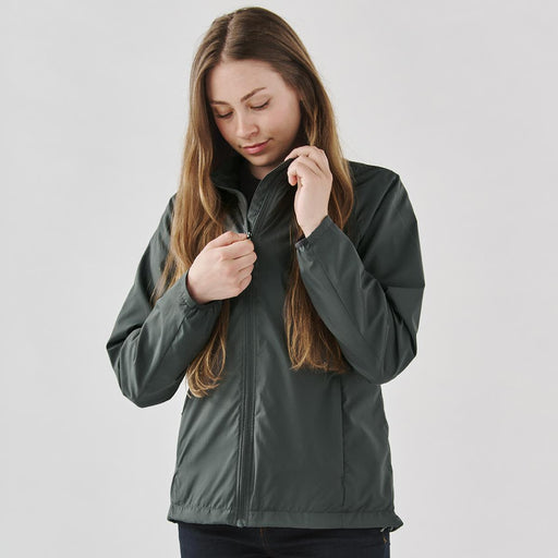Women's Pacifica Full Zip Jacket - A women’s full zip rain jacket in dark grey, featuring a zippered front and a subtle logo.