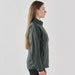 Women's Pacifica Full Zip Jacket - A women's full zip jacket in dark green, featuring a fitted design and a logo on the front.