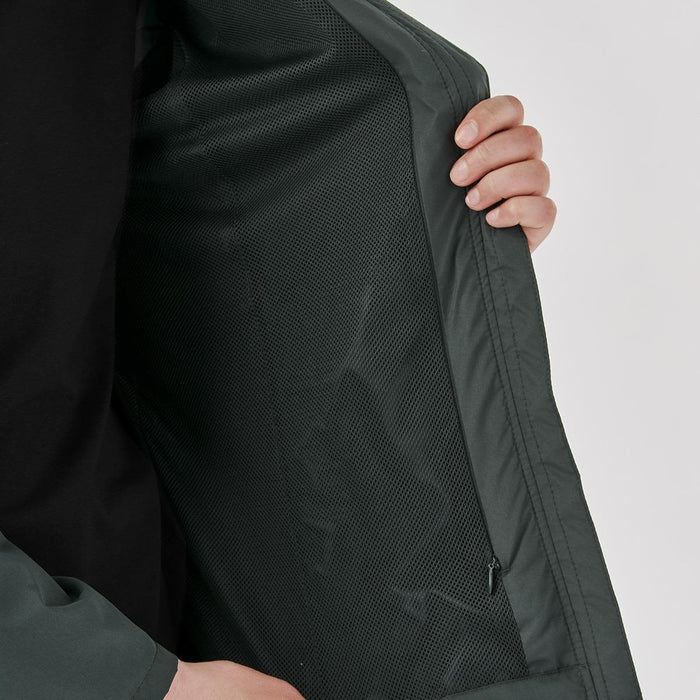 Women's Pacifica Full Zip Jacket - A women's full zip rain jacket in dark grey, featuring a mesh interior and a zippered pocket.