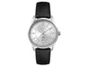 Ladies Casual Dress Watch, Leather Strap - A silver watch with a minimalist dial and a black leather strap, featuring a logo on the face.