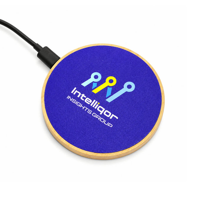 Crescent Illuminating Wireless Charger - A circular wireless charger with a wooden base and a blue top featuring a logo.