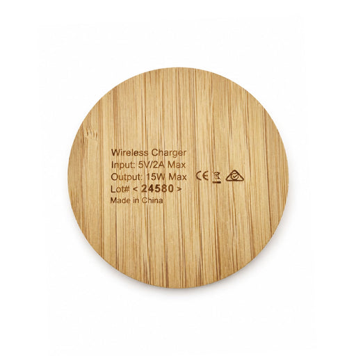 Crescent Illuminating Wireless Charger - A round wireless charger made of bamboo, featuring a smooth, natural wood finish and a logo.