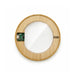 Crescent Illuminating Wireless Charger - A circular wireless charger with a bamboo outer frame and a glass centre, featuring internal electronic components.