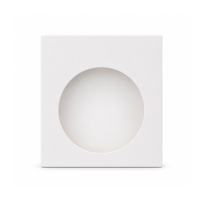 Crescent Illuminating Wireless Charger - A white box with a circular cut-out in the centre, designed for packaging a product.