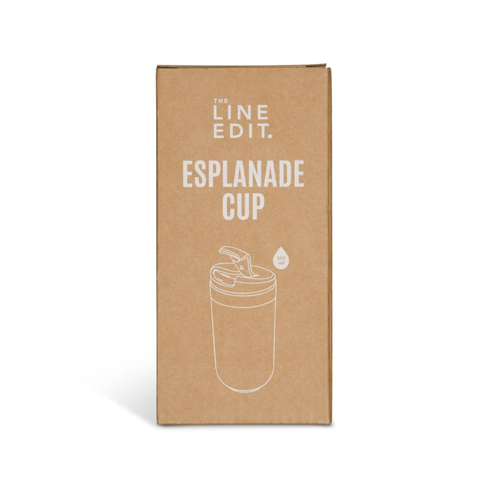 Esplanade Coffee Cup by The Line Edit. - A coffee cup packaging in cream with a lid, featuring a simple logo and a water droplet design.