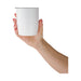 Indiana Coffee Cup - A white coffee cup held in a hand, featuring a simple design and a clear lid. It has a logo visible on the front.