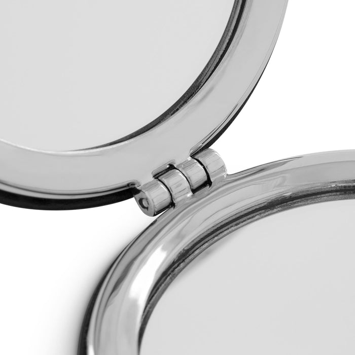 Finesse Compact Mirror - A silver compact mirror featuring a polished finish, showing two mirrored surfaces inside. It has a hinge for easy opening.