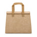 Wayfarer Cooler Bag - A tan cooler bag with a flat design and two woven handles, featuring a simple and minimalist look.