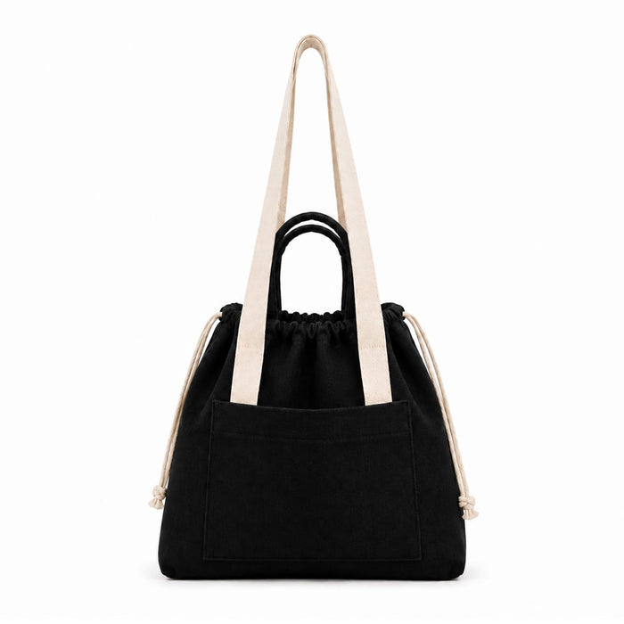 Darby Tote Bag - A black tote bag with a drawstring closure, featuring a front pocket and dual straps in a contrasting colour.
