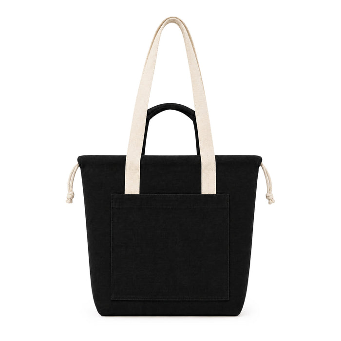 Darby Tote Bag - A black tote bag with cream handles and a front pocket, featuring a logo.