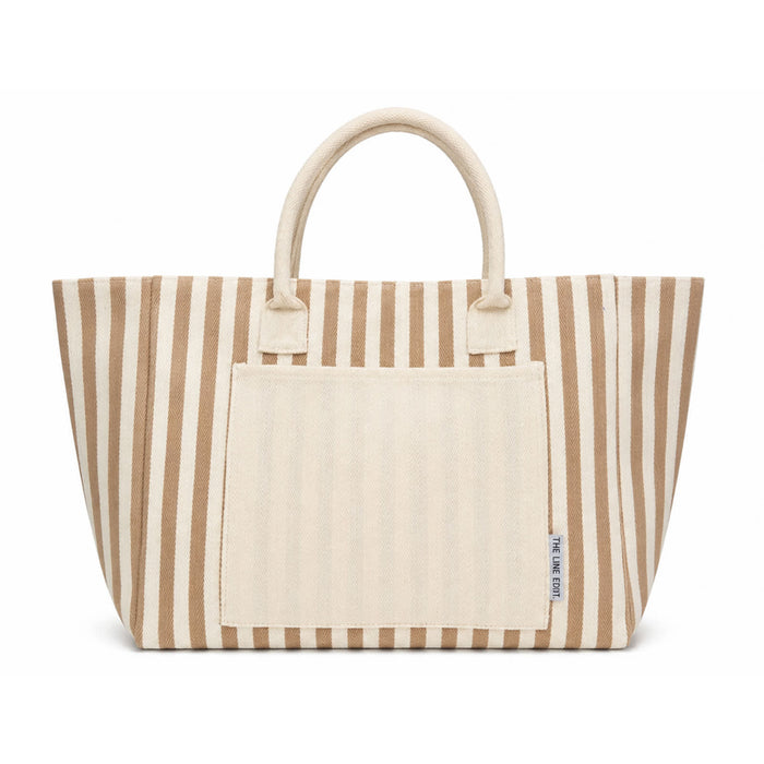 The Good Stuff Pack - A striped tote bag in beige and cream featuring two handles and a front pocket. Branding is present on the bag.