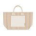 Hampton Tote Bag by The Line Edit. - A large tote bag featuring horizontal stripes in beige and cream, with a solid pocket and handles.
