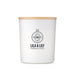 The Brew Ritual - A large white glass candle with a wooden lid and a logo, featuring a floral design.