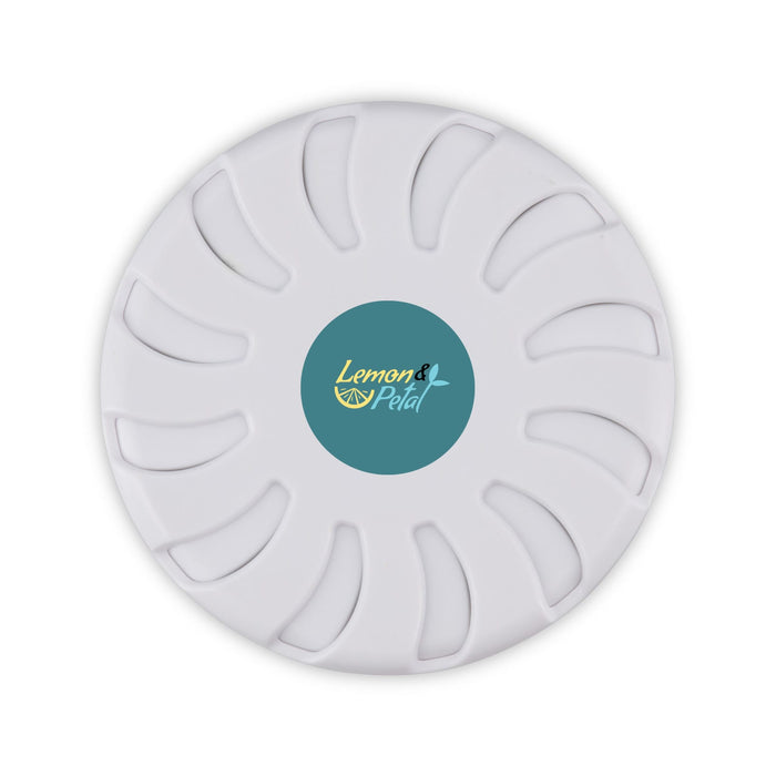 Bloom Fragrance Pot - A white fragrance pot with a circular design and a teal central logo. Ideal for home use.