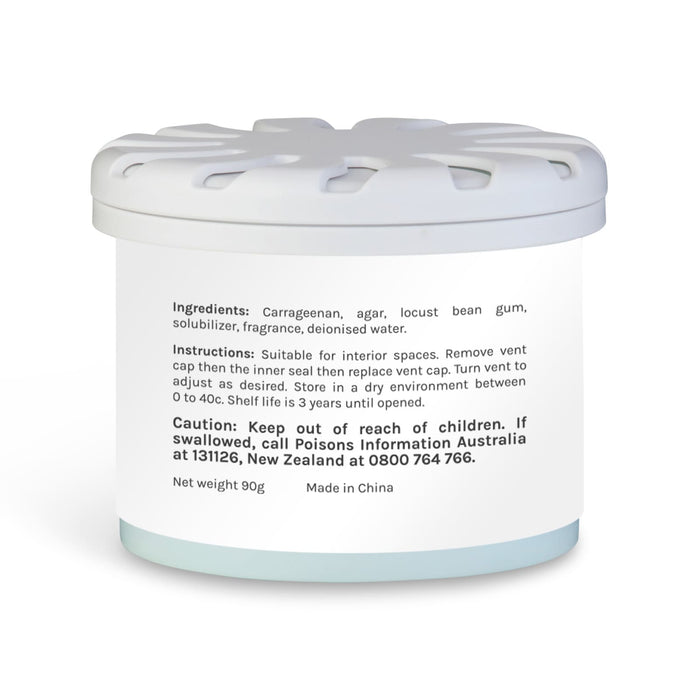 Bloom Fragrance Pot - A white fragrance pot with a light blue base, featuring a floral design on the lid and an ingredient label.