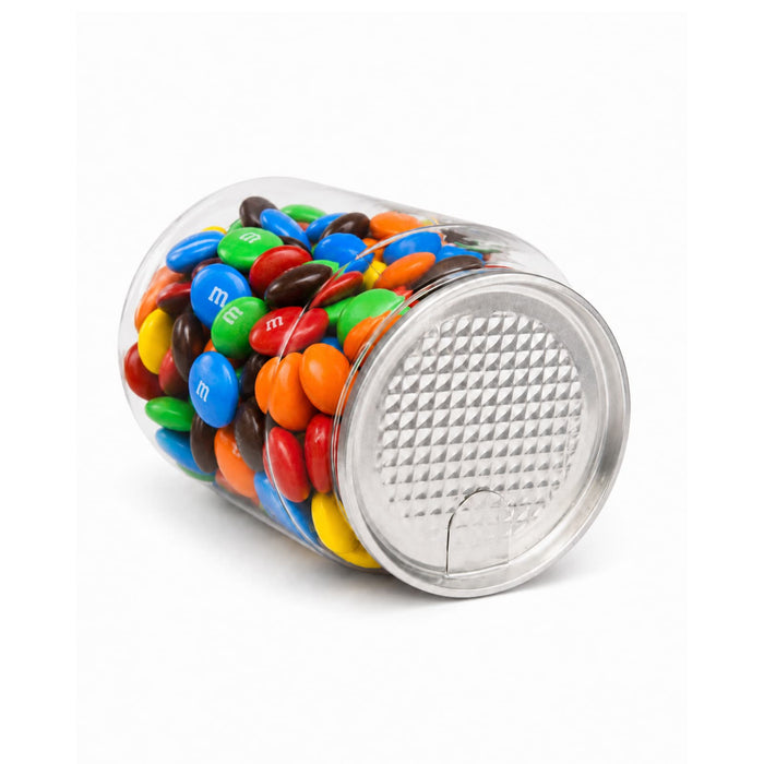 M&M's in Clear Can 180g - A clear canister filled with colourful M&M's, including blue, green, yellow, red, orange, and brown candies.